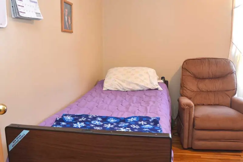 Furnished private bedroom with recliner